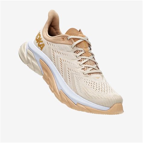 beige athletic shoes for women.